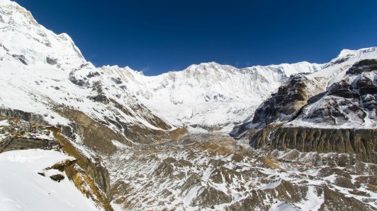 Snow Covered Trails with Majestic Mountains
